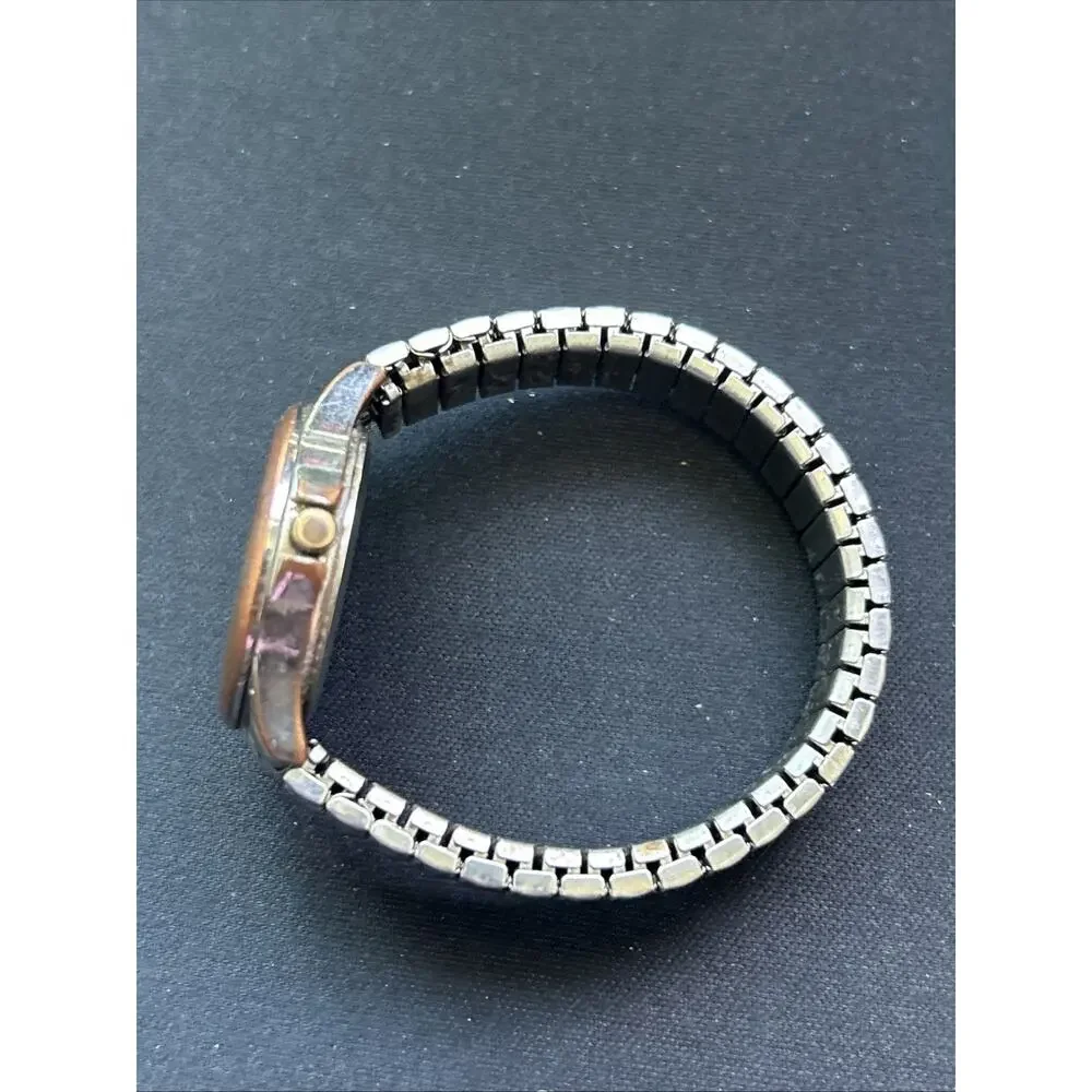 Sutton Silver Tone Worn Bronze Tone Bezel Women’s Stretch Band Quartz Watch